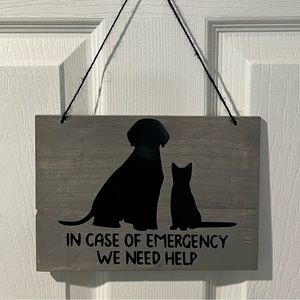 In case of emergency we need help (cat and dog) sign.